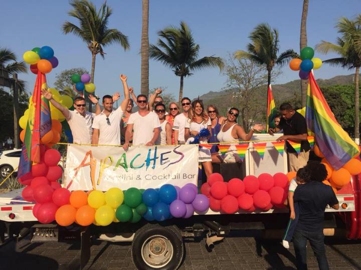 Apaches martini and cocktail bar party goers in the Vallarta gay pride parade