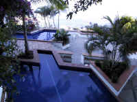 looking from the Jacuzzi in the master bedroom's larger patio down at the living level #4