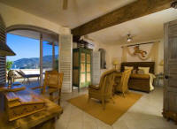 master bedroom with balcony and views