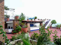 balcony view of building terrace and dipping pool