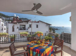 Enjoy the large patio with a view of the beach, Banderas Bay and the Romantic Zone 