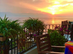 The La Palapa 606 balcony patio is the perfect place to enjoy the sunset - winter holidays