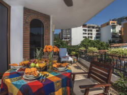 Comfortable table and chairs on the large patio to lounge and relax and enjoy the views