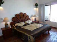 master bedroom of penthouse La Palapa condominium
