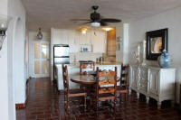 playa bonita condo 204 dining and kitchen area