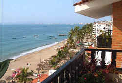 looking to north along puerto vallarta los muertos beach