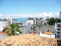 bay, town and mountain views from condominium rooftop area