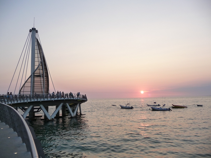 sunset along vallarta main beach los Muertos and the Pier