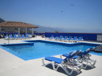 clear weather January in puerto vallarta - looking south on the rooftop pool