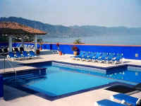 vds condo buildlng rooftop pool, terrace and view to south gay puerto vallarta