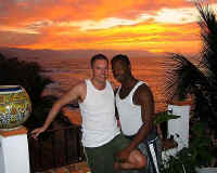 blue chairs rooftop gay vacation couple