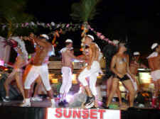 sunset cruise dancers - top gay vacation destination Puerto Vallarta