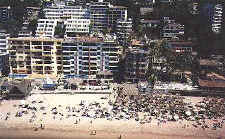 the blue and green chairs on playa los muertos