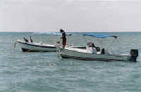 luis on his panga near the pier los muertos