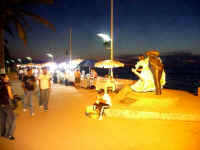 statue to the xiutla folkloric dancers on the New Malecon